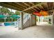Under-house pool area with stairs and kayaks at 15 31St Ave, Isle of Palms, SC 29451