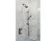 Walk-in shower with marble tile and multiple shower heads at 15 31St Ave, Isle of Palms, SC 29451