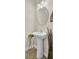 Small bathroom with pedestal sink, round mirror, and tiled floor at 153 Instructor Ct, Ladson, SC 29456