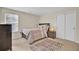 Cozy bedroom with a double bed, dresser, and carpet flooring at 153 Instructor Ct, Ladson, SC 29456