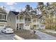 Two-story house with a gray exterior, white trim, and a two-car garage at 153 Instructor Ct, Ladson, SC 29456