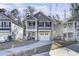 Two-story house with a gray exterior, white trim, and a two-car garage at 153 Instructor Ct, Ladson, SC 29456