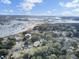 Aerial view of waterfront home and neighborhood at 1661 Battalion Dr, Charleston, SC 29412