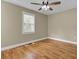 Spacious bedroom with hardwood floors and a ceiling fan at 1661 Battalion Dr, Charleston, SC 29412
