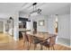 Open concept dining area with a view of the living room and kitchen at 1661 Battalion Dr, Charleston, SC 29412