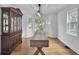 Formal dining room with hardwood floors and large windows at 1661 Battalion Dr, Charleston, SC 29412