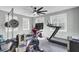 Home gym with various equipment including treadmill and stationary bike at 1661 Battalion Dr, Charleston, SC 29412