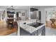 Kitchen island with granite countertop and cooktop at 1661 Battalion Dr, Charleston, SC 29412