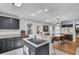 Open concept kitchen with island and granite countertops at 1661 Battalion Dr, Charleston, SC 29412