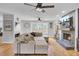 Spacious living room with sectional sofa, fireplace and hardwood floors at 1661 Battalion Dr, Charleston, SC 29412