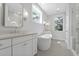 Bright bathroom with double vanity, freestanding tub, and a glass-enclosed shower at 1892 Grover Rd, Johns Island, SC 29455