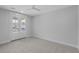 Bedroom featuring carpet floors, neutral walls, and french doors to balcony at 1892 Grover Rd, Johns Island, SC 29455