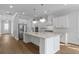 Spacious kitchen with a large island and stainless steel appliances at 1892 Grover Rd, Johns Island, SC 29455