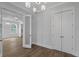 Neutral living room with wood floors and white trim at 1892 Grover Rd, Johns Island, SC 29455