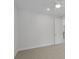 Bright bedroom featuring a ceiling fan, neutral carpet, and white doors at 1894 Grover Rd, Johns Island, SC 29455
