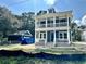 Two story home with detached garage and balcony at 1894 Grover Rd, Johns Island, SC 29455