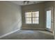 Spacious bedroom with large window and neutral decor at 1908 Basildon Rd, Mount Pleasant, SC 29466