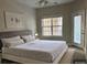 Bright bedroom with king-size bed and access to balcony at 1908 Basildon Rd, Mount Pleasant, SC 29466