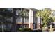 Brick building with screened porches and palm trees at 1908 Basildon Rd, Mount Pleasant, SC 29466