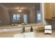 Kitchen features a breakfast bar, double sink, and view into living room at 1908 Basildon Rd, Mount Pleasant, SC 29466
