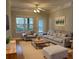 Spacious living room with hardwood floors and comfy furniture at 1908 Basildon Rd, Mount Pleasant, SC 29466