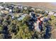 Aerial view showing home's location in a waterfront community with tennis courts at 2014 Long Bend Dr, Seabrook Island, SC 29455
