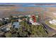 Aerial view showing home's location in a waterfront community with tennis courts at 2014 Long Bend Dr, Seabrook Island, SC 29455