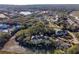 Aerial view showing home's location in a peaceful, wooded setting at 2014 Long Bend Dr, Seabrook Island, SC 29455