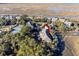 Aerial view of the property and tennis courts nearby at 2014 Long Bend Dr, Seabrook Island, SC 29455