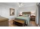 Cozy bedroom with ceiling fan and wood floors at 2014 Long Bend Dr, Seabrook Island, SC 29455