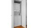 Convenient laundry closet with stacked washer and dryer at 2014 Long Bend Dr, Seabrook Island, SC 29455