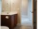 Bathroom boasts a wood vanity and neutral color scheme at 207 Loocock Dr, Goose Creek, SC 29445