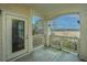 Covered balcony offering wooded views and exterior access at 2244 Ashley Crossing Dr # 333, Charleston, SC 29414