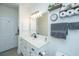 Modern bathroom with white vanity and a large mirror at 2244 Ashley Crossing Dr # 333, Charleston, SC 29414