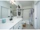 Clean bathroom with white vanity, bathtub, and shower at 2244 Ashley Crossing Dr # 333, Charleston, SC 29414