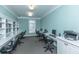 Community room with computers, printer, and ample shelving at 2244 Ashley Crossing Dr # 333, Charleston, SC 29414