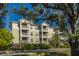 Three-story building with balconies and landscaping at 2244 Ashley Crossing Dr # 333, Charleston, SC 29414