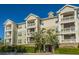 Multi-level building with balconies and lush landscaping at 2244 Ashley Crossing Dr # 333, Charleston, SC 29414