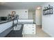 Modern kitchen with white cabinets and granite at 2244 Ashley Crossing Dr # 333, Charleston, SC 29414