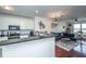 Modern kitchen with white cabinets and granite at 2244 Ashley Crossing Dr # 333, Charleston, SC 29414