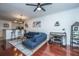 Living area features hardwood floors, sectional sofa, and home office at 2244 Ashley Crossing Dr # 333, Charleston, SC 29414