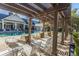 Community pool with pergola and surrounding seating at 2244 Ashley Crossing Dr # 333, Charleston, SC 29414