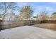 Large backyard with patio and wooden fence at 226 Comiskey Park Cir, Summerville, SC 29485
