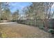 Fenced backyard with a large patio area at 226 Comiskey Park Cir, Summerville, SC 29485