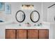 Bathroom with double vanity and stylish mirrors at 226 Comiskey Park Cir, Summerville, SC 29485