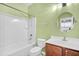 Clean bathroom with a tub shower combo and wood vanity at 226 Comiskey Park Cir, Summerville, SC 29485