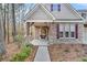 Inviting house entrance with stone accents and porch at 226 Comiskey Park Cir, Summerville, SC 29485