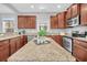 Spacious kitchen with granite countertops and stainless steel appliances at 226 Comiskey Park Cir, Summerville, SC 29485