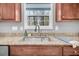 Kitchen sink and granite countertop with modern faucet at 226 Comiskey Park Cir, Summerville, SC 29485