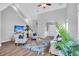Bright living room featuring hardwood floors and a vaulted ceiling at 226 Comiskey Park Cir, Summerville, SC 29485